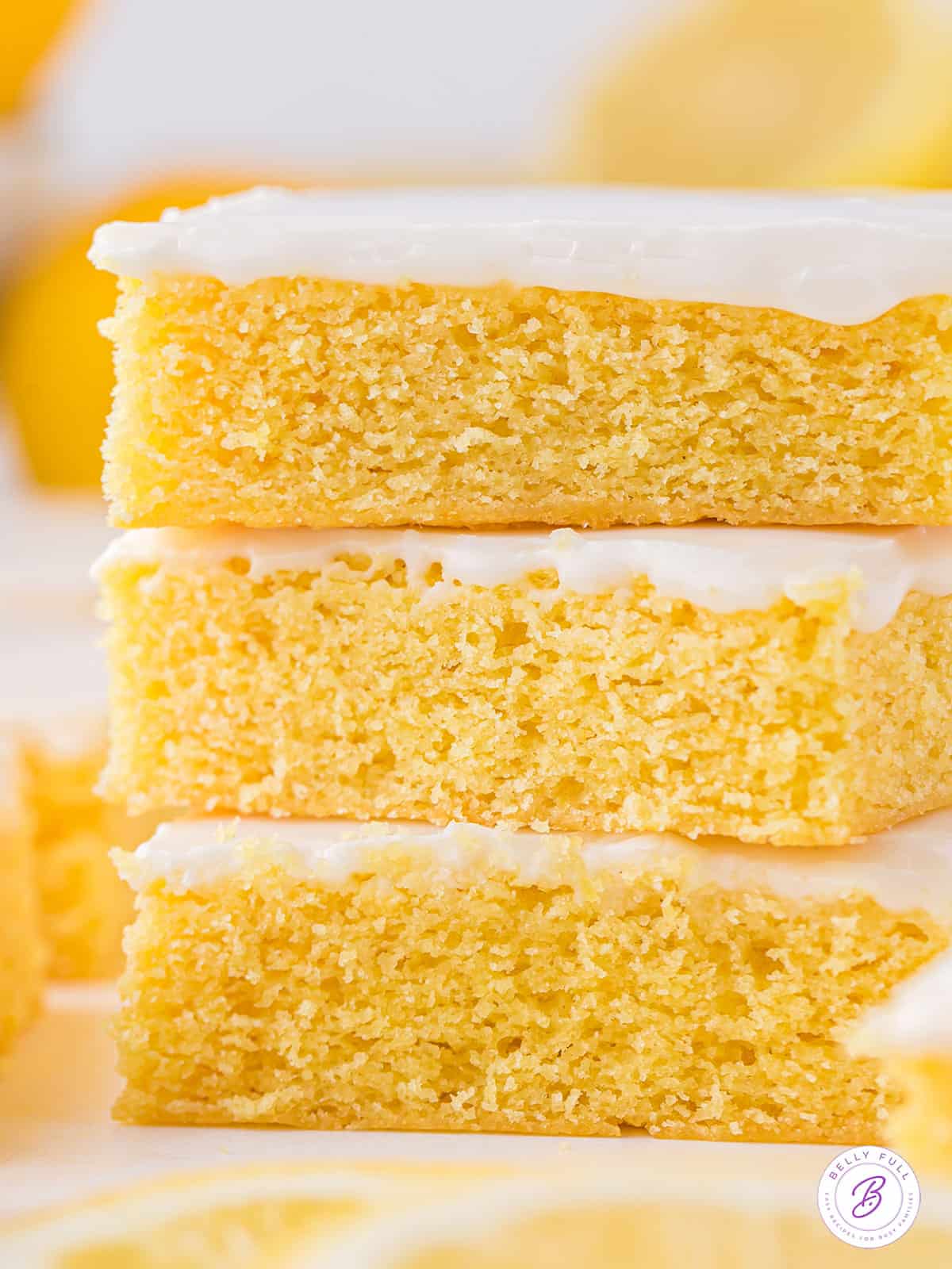 Three lemon blondies stacked on each other