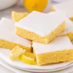 Angled overhead view of a plate of lemon blondies