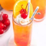 Orange Creamsicle Shirley Temple with whipped cream and a cherry