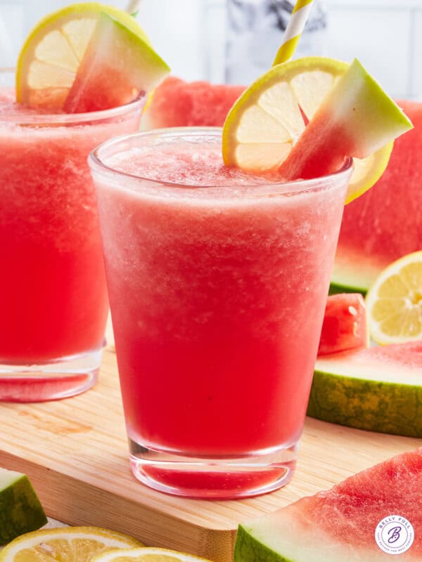 watermelon slushie with watermelon cube and lemon slice