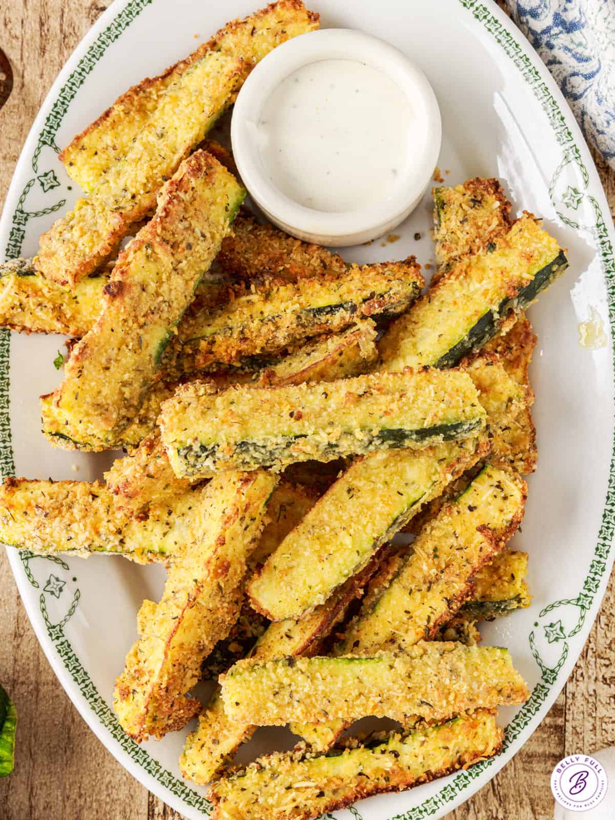 overhead plate of breaded zucchini wedges