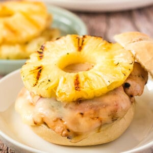 open faced grilled chicken sandwich with pineapple slice on top