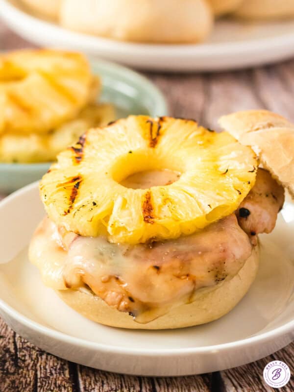 open faced grilled chicken sandwich with pineapple slice on top