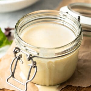 glass jar of honey sesame dressing