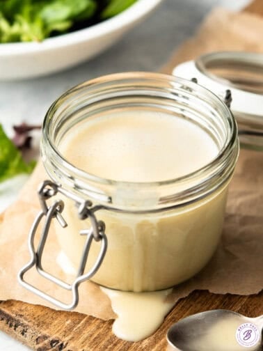 glass jar of honey sesame dressing