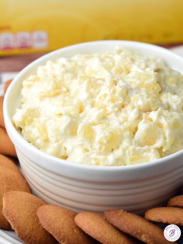 pineapple dip piled high in white cup