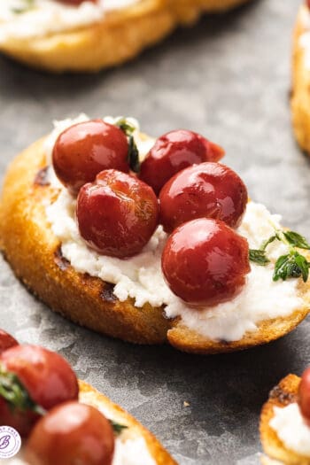 crostini with roasted red grapes and ricotta