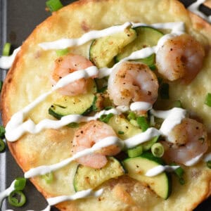 overhead shrimp and zucchini tostadas with sour crema