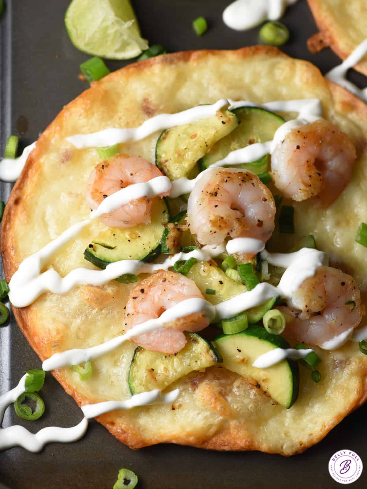 overhead shrimp and zucchini tostadas with sour crema