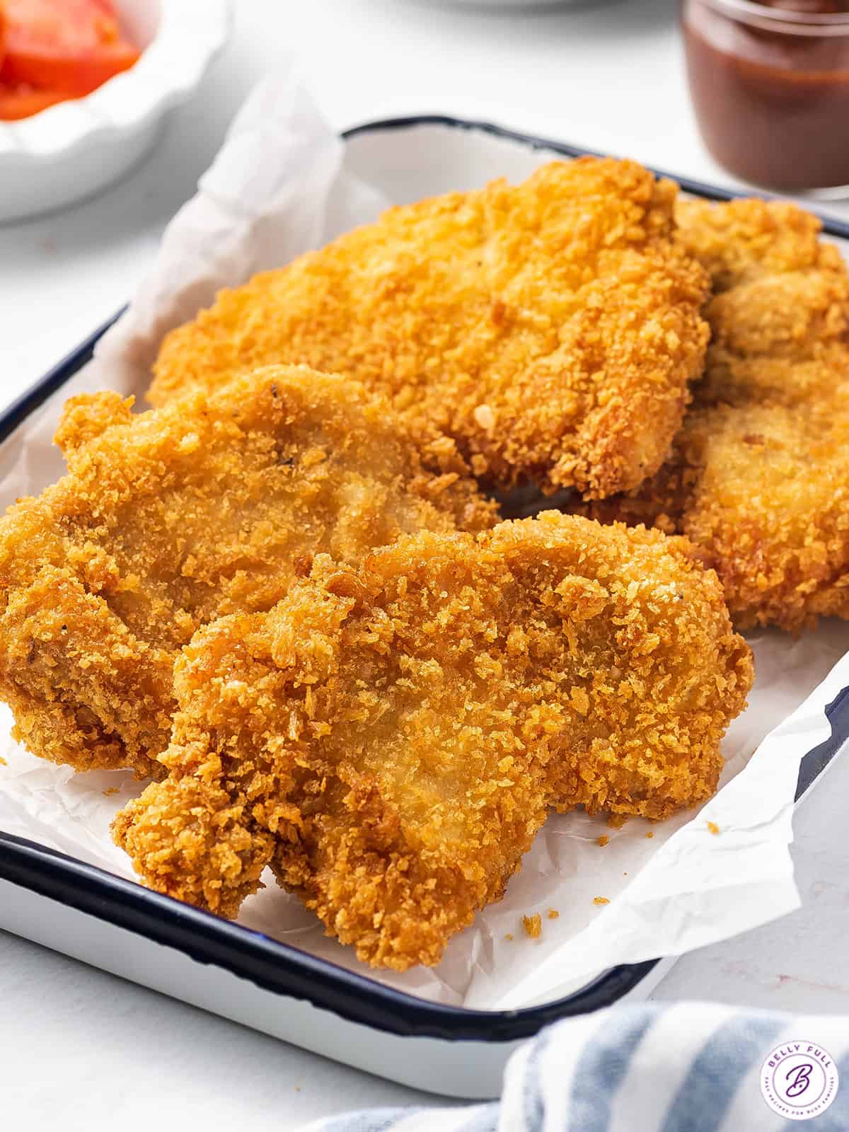 Overhead view of panko chicken on a tray