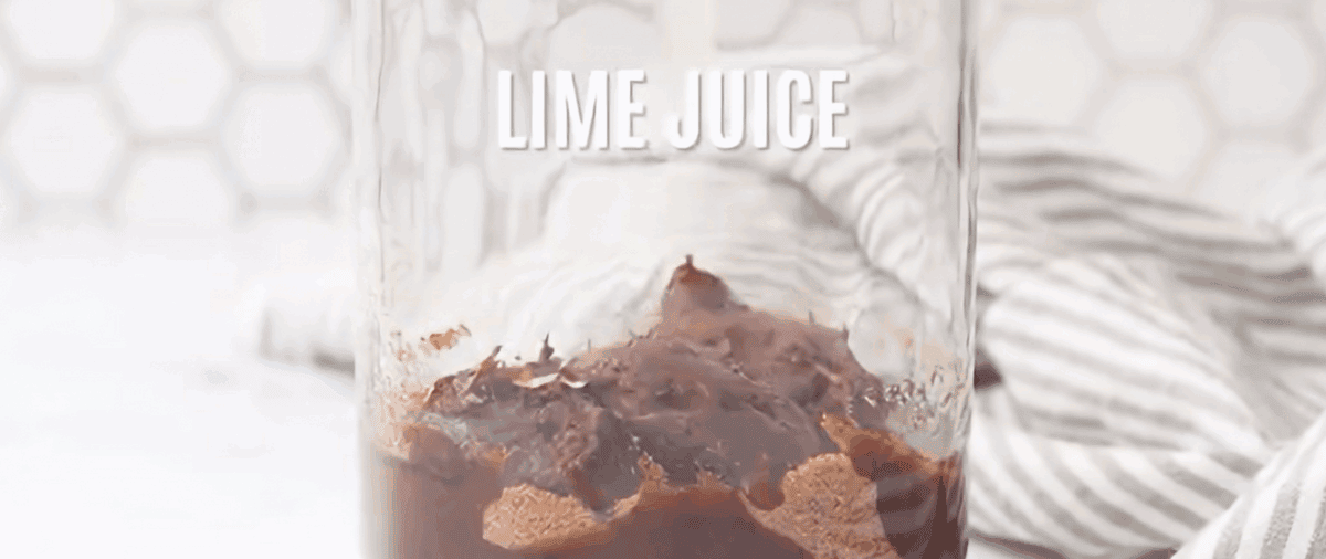 Combining the ingredients to make the Pad Thai sauce.