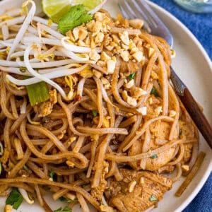 Angled view of a plate of chicken pad thai