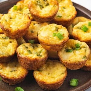 crustless crab quiche bites piled on plate