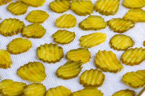 hamburger pickle chips draining on paper towel