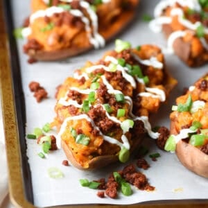 twice baked sweet potato with chorizo and sour cream drizzle