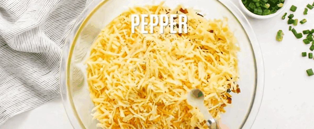 Combining all the ingredients in a glass bowl.