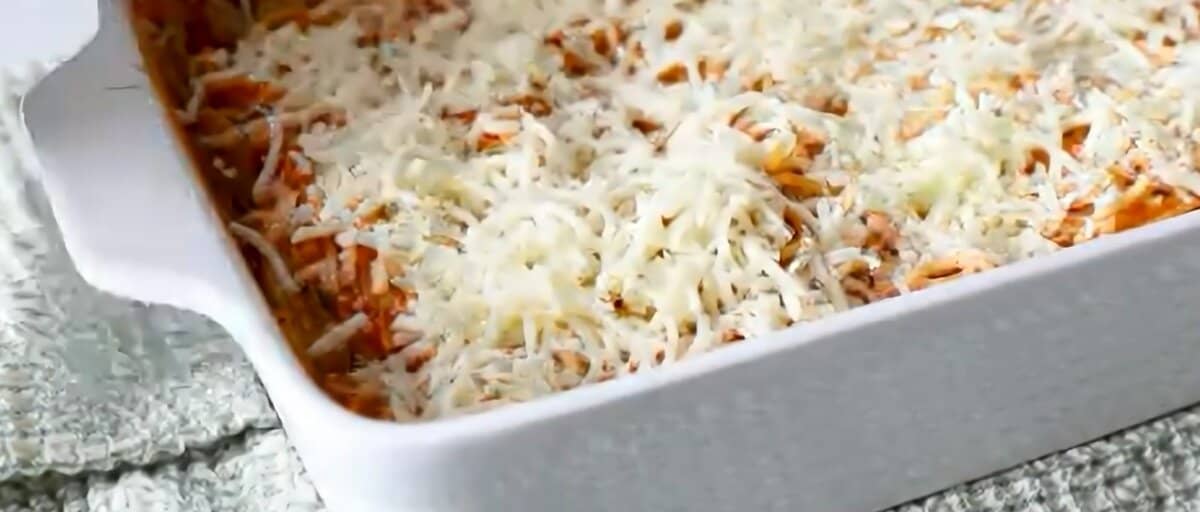 Mozzarella cheese sprinkled on top of the spaghetti bake.