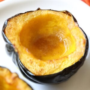 roasted acorn squash half with melted butter