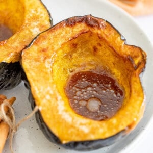 Overhead view of air fryer acorn squash with brown sugar