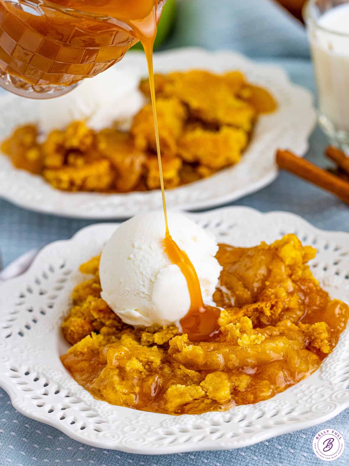 caramel drizzle over ice cream and apple dump cake