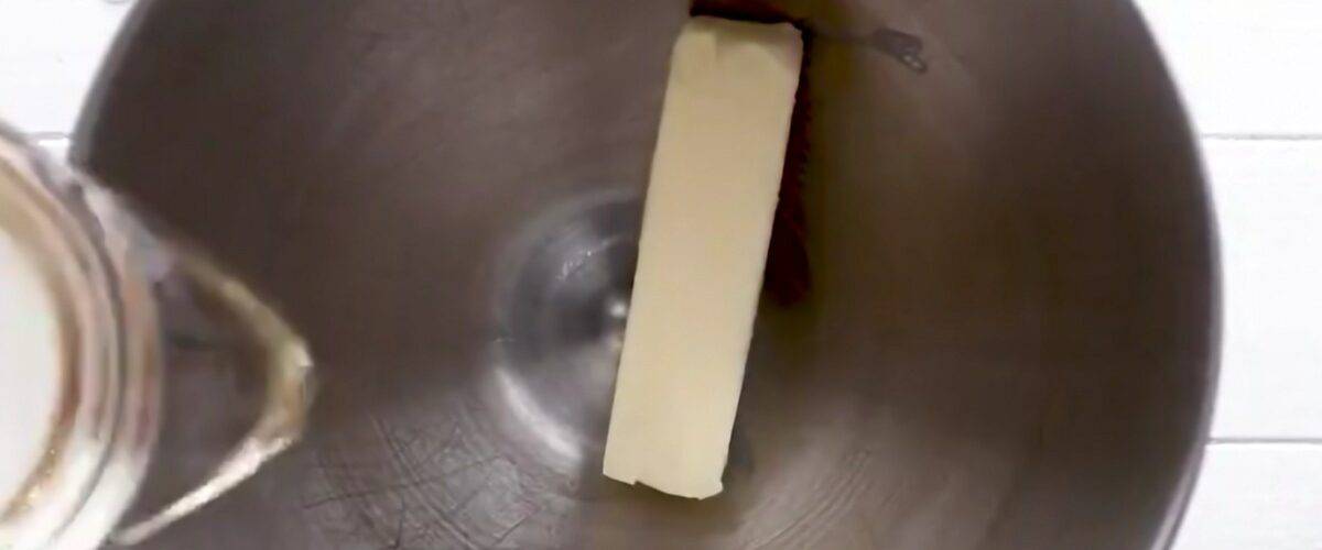 Creaming butter, oil, and sugar in a stand mixer.