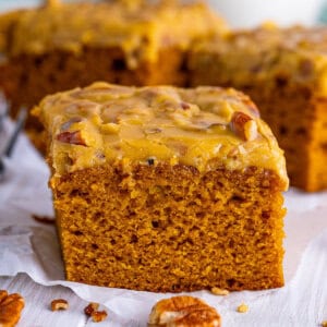 Squares of pumpkin cake with praline frosting
