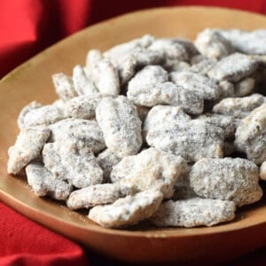 pile of candied pecans in wooden serving bowl