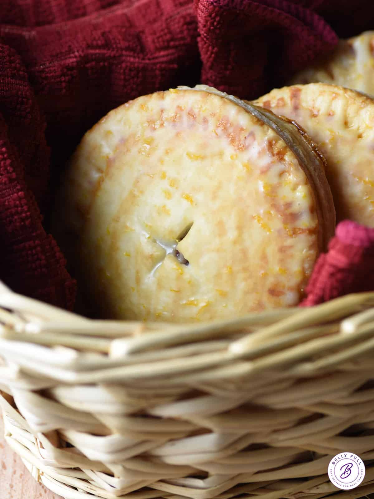 glazed hand pies in wicker basket