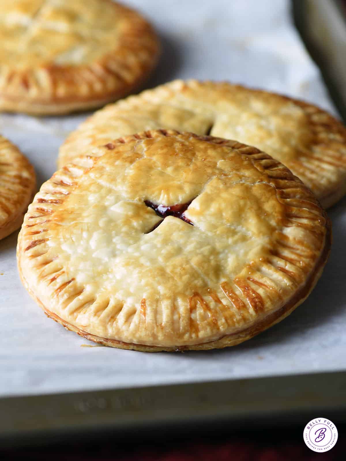 baked hand pies on parchment paper