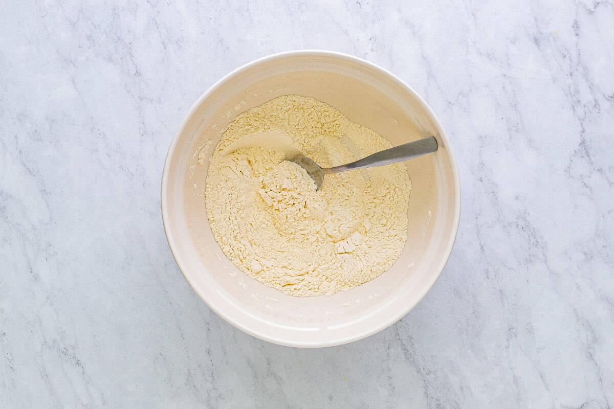 Combining the dry ingredients for the German chocolate cake.