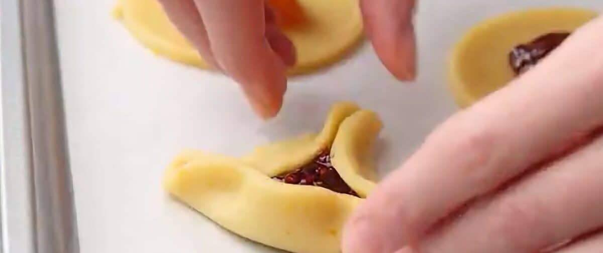 Shaping the hamantaschen.