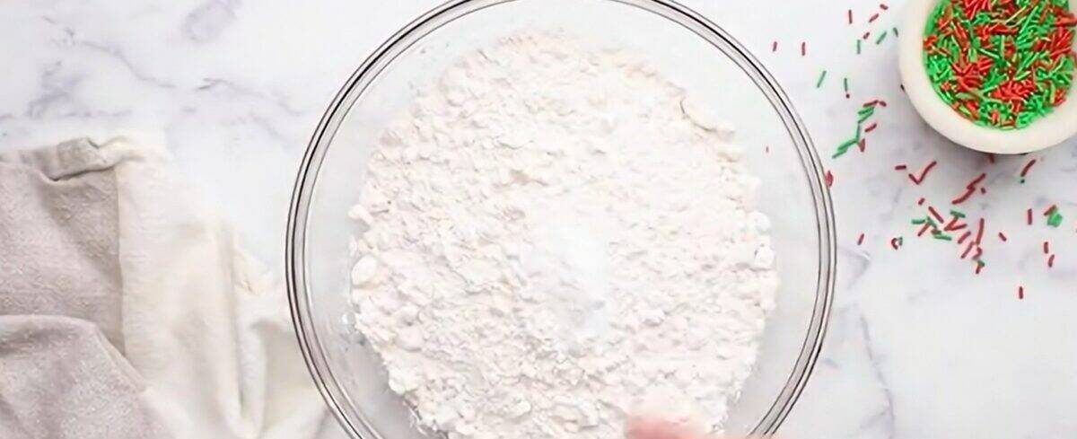 Combining the dry ingredients in a glass bowl.