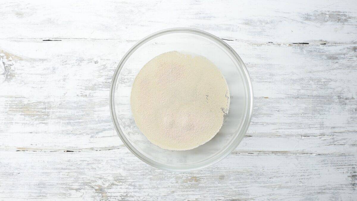 Activating the yeast in a glass bowl.