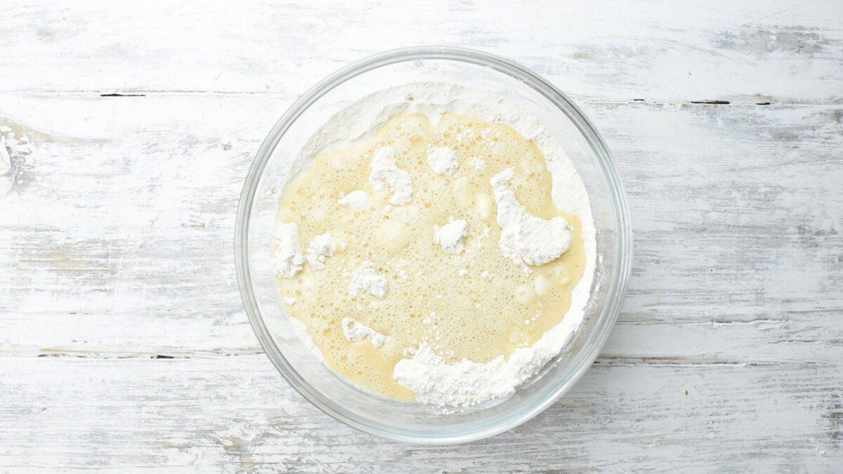 Adding the wet ingredients to the dry.