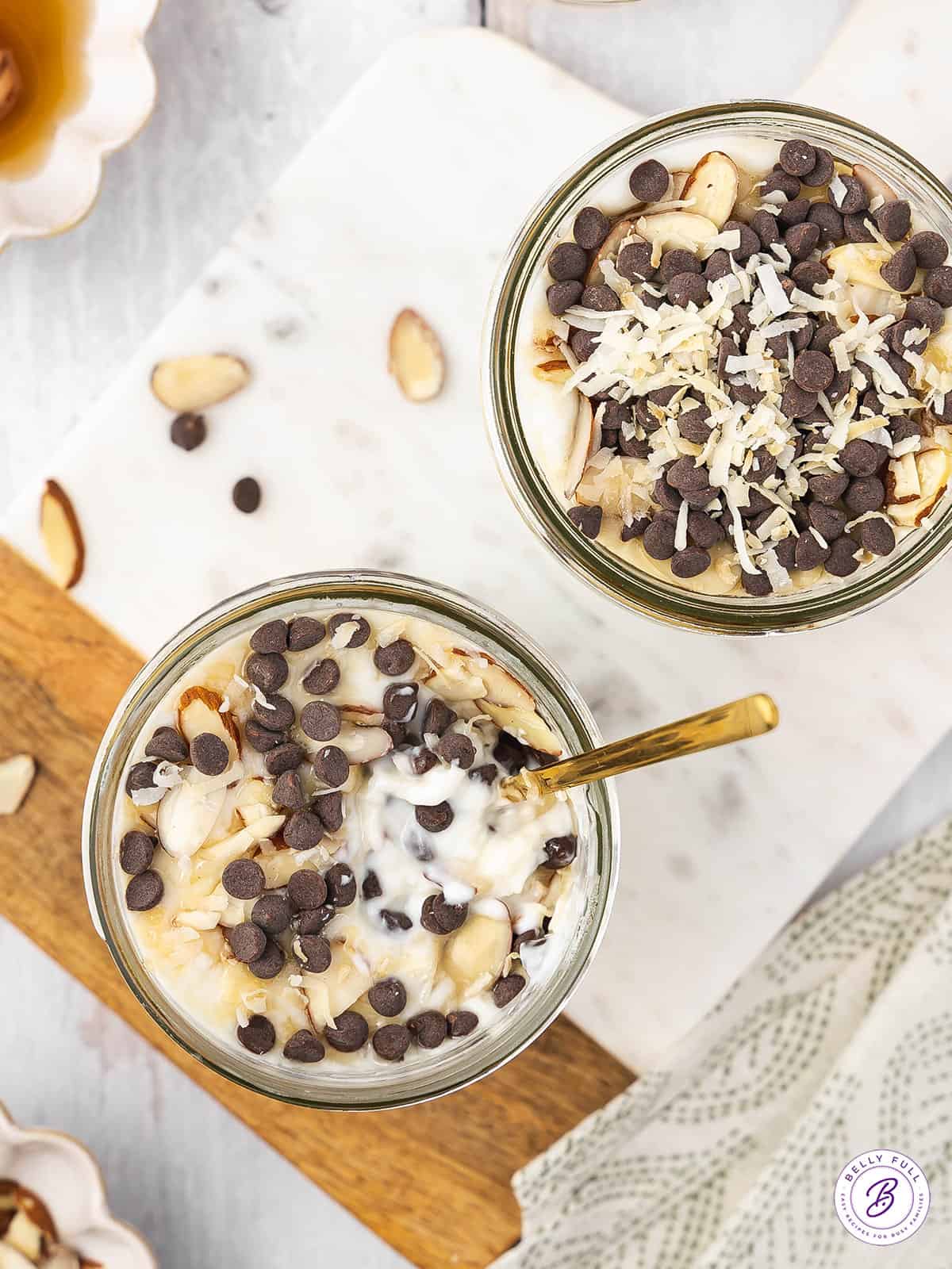 2 jars overhead filled with yogurt, coconut, and chocolate chips