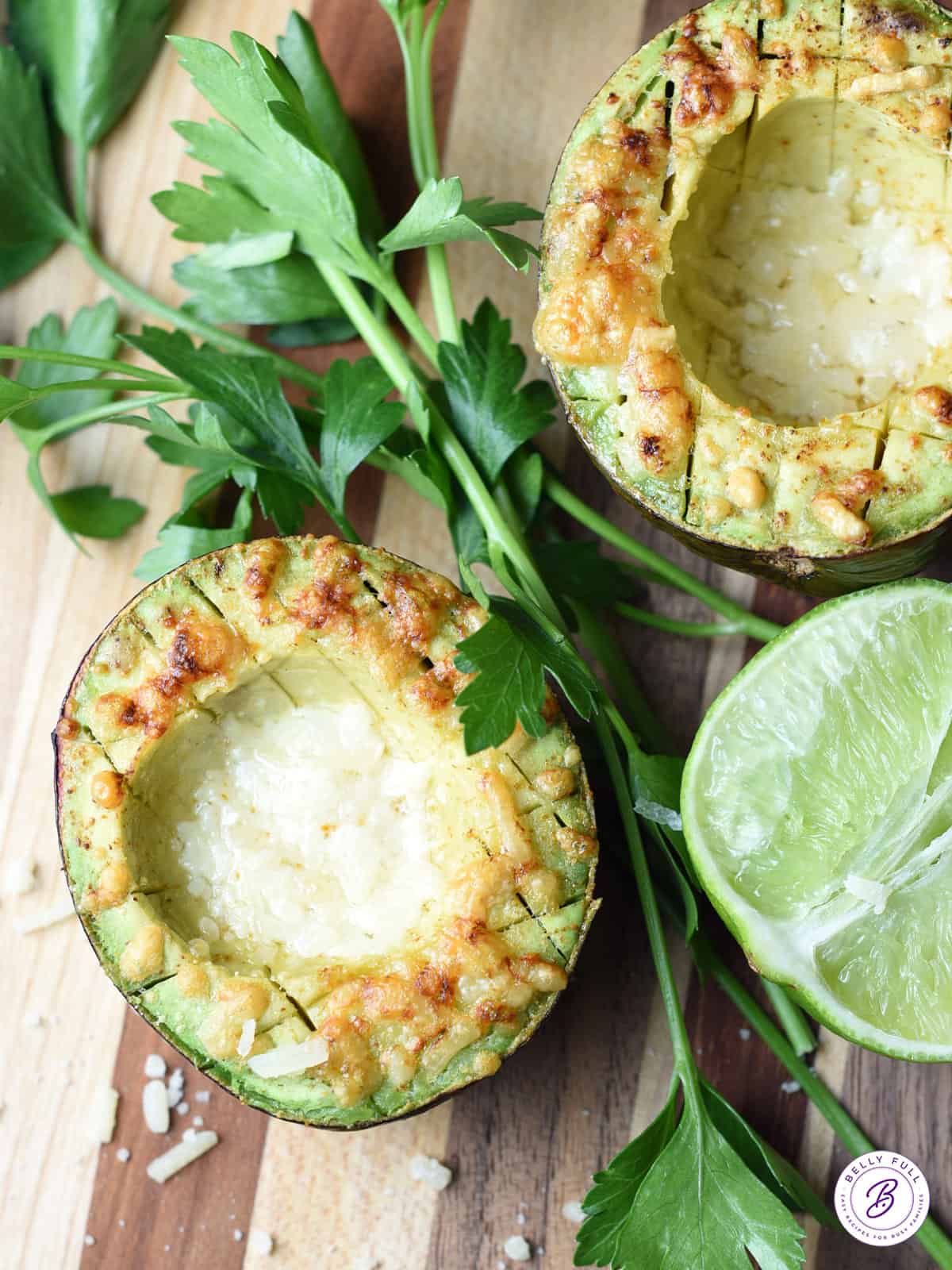 overhead broiled avocado with parmesan cheese and lime