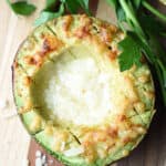 overhead broiled avocado with parmesan cheese