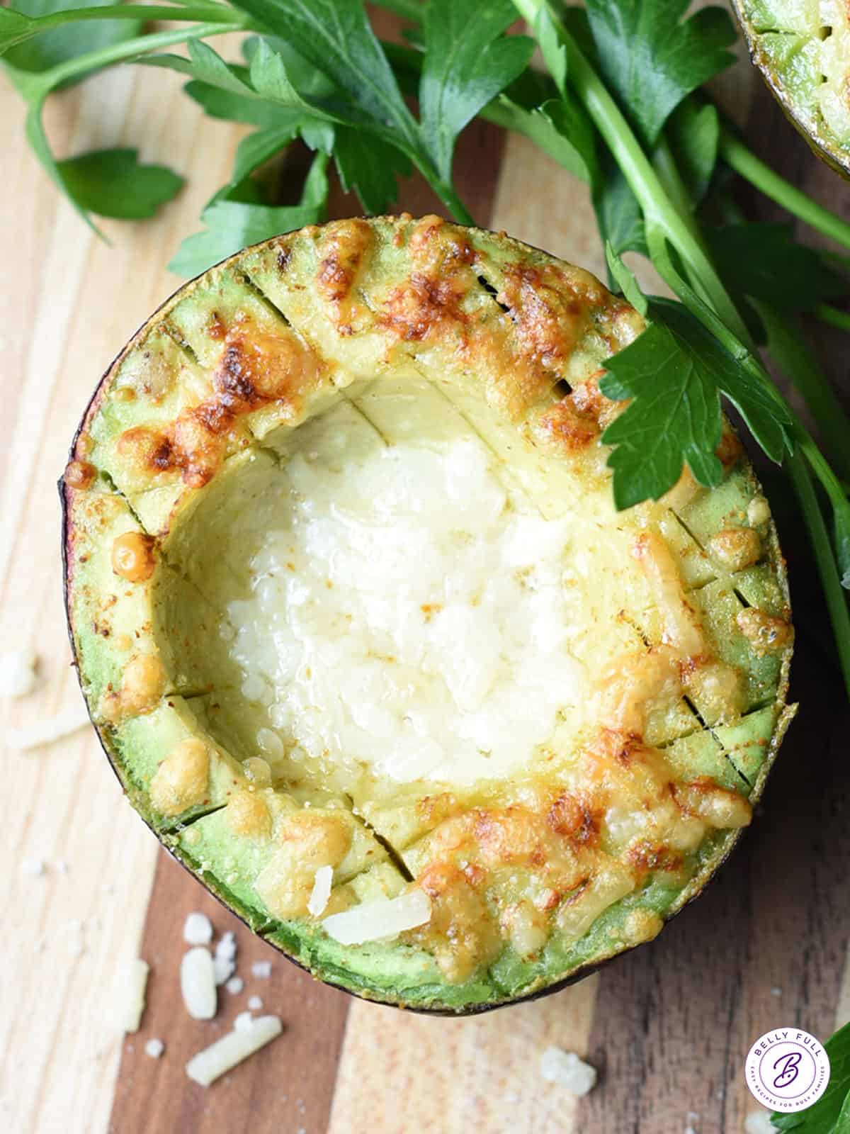 overhead broiled avocado with parmesan cheese