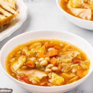 Angled view of a bowl of healthy cabbage soup