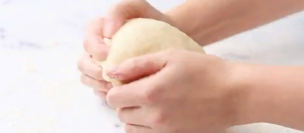 Kneading the dumpling dough.