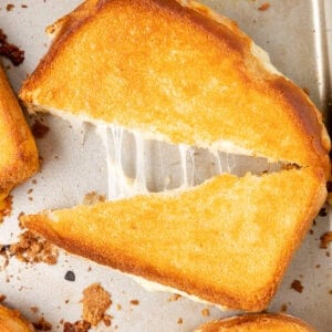 Oven grilled cheese cut in half