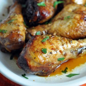close up glazed honey soy chicken drumstick