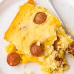 square piece of corn dog casserole on white plate