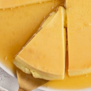 A spatula serving a slice of flan