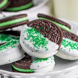white chocolate coated mint oreos with green sanding sugar