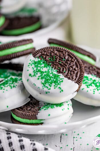 white chocolate coated mint oreos with green sanding sugar