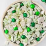 overhead bowl of Muddy Buddies with Green M&Ms