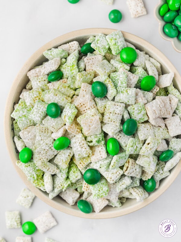 overhead bowl of Muddy Buddies with Green M&Ms