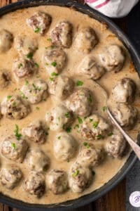 overhead skillet of gravy smothered Swedish meatballs