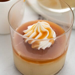 Glass of butterscotch pudding and caramel whipped cream